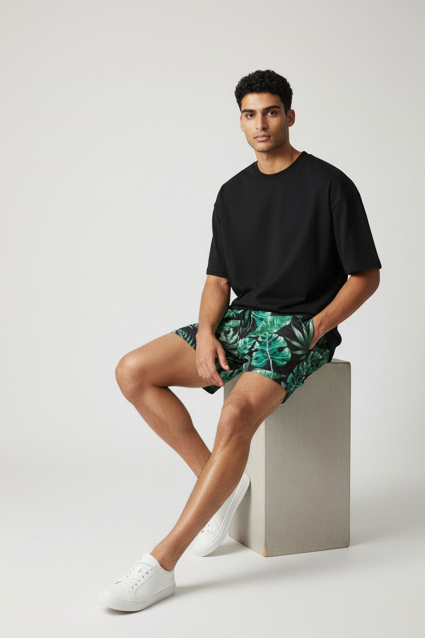 Christian Audigier Low Waist Swim Shorts. Black Print & Green Palm Leaves. BMS6190013M