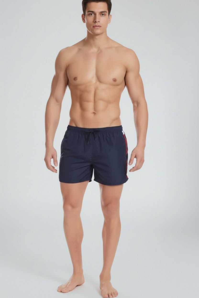 Christian Audigier Deep Solid Blue Low Waist Swim Shorts with Side Stripes. BMS6190007M